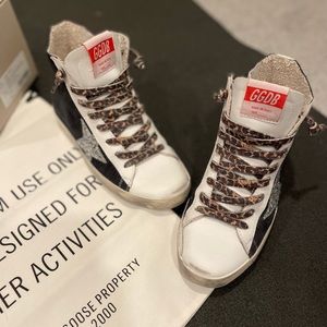 Golden goose Francie with corduroy and glitter star.